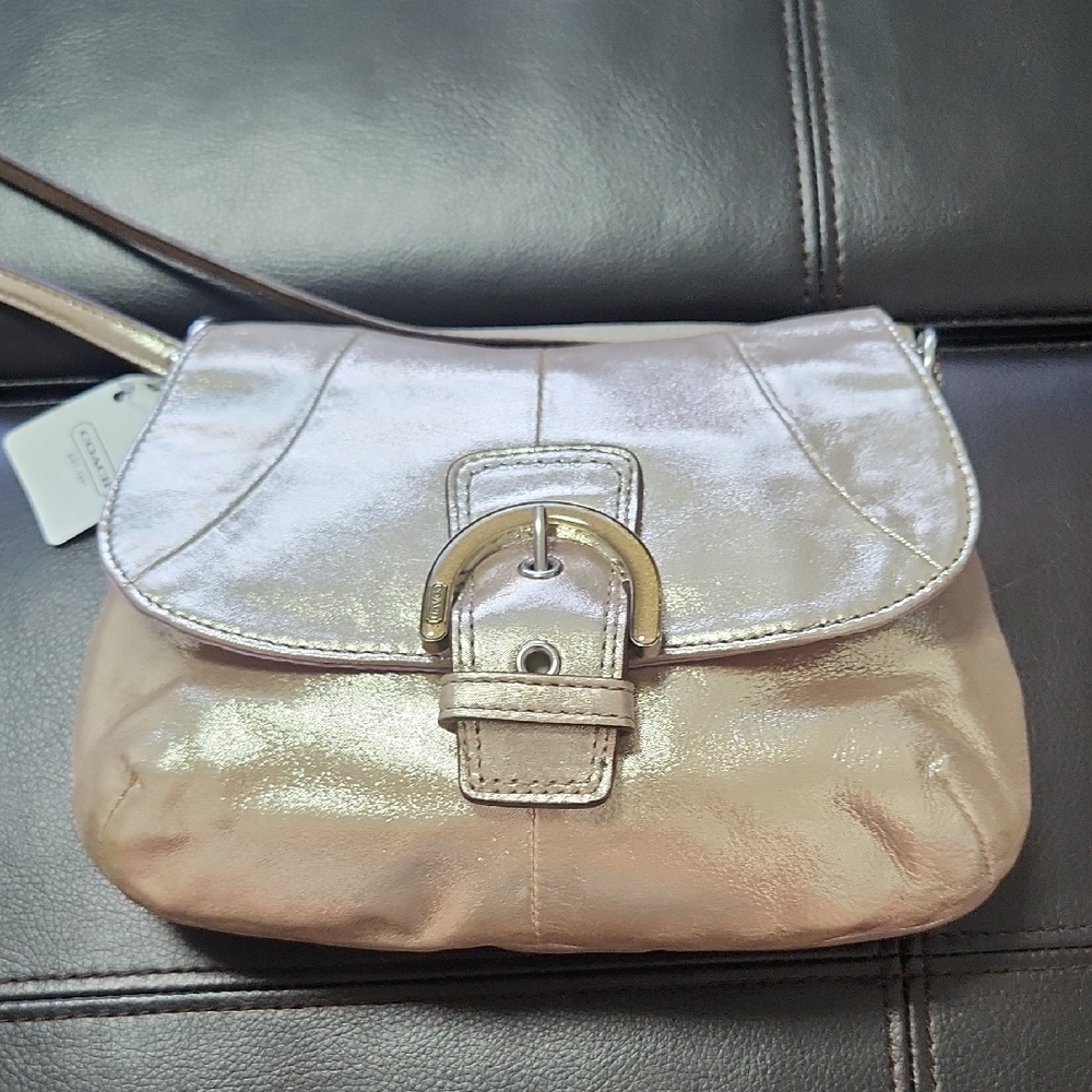 Coach Pink Crossbody Bag with Flap-Over Closure and Gold Hardware